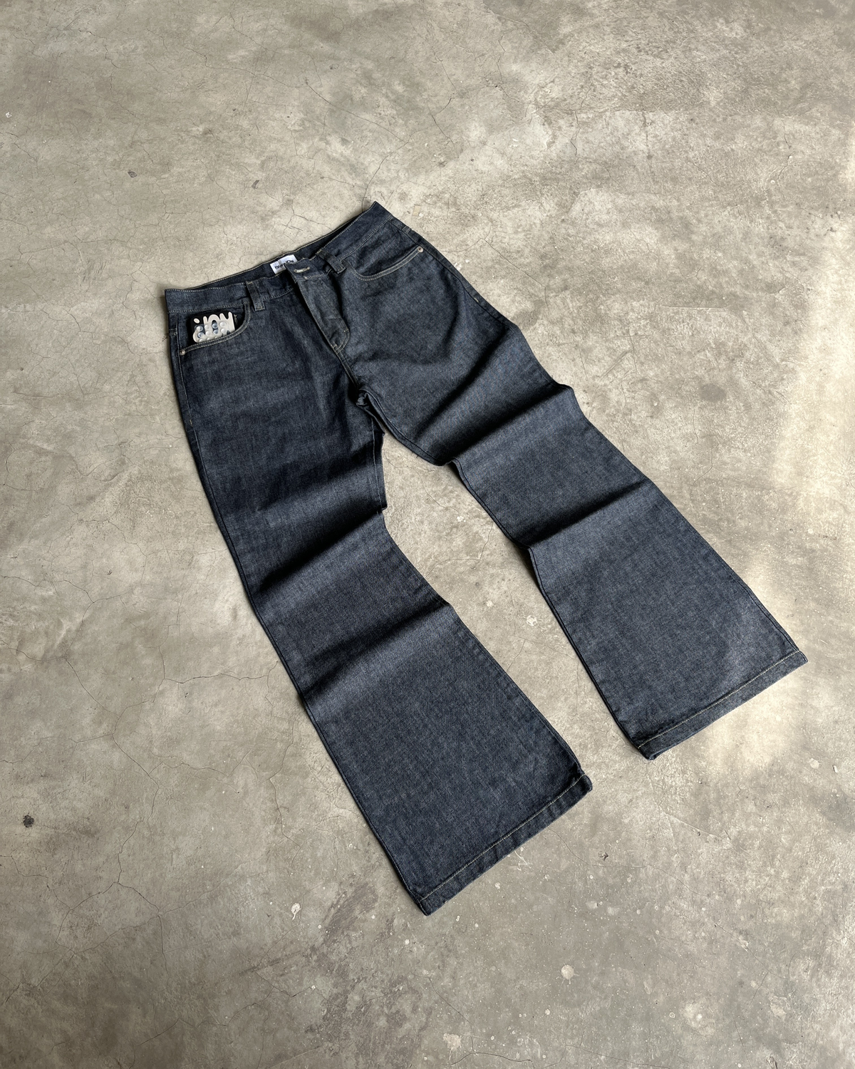 Jean Bootcut Raw Azul